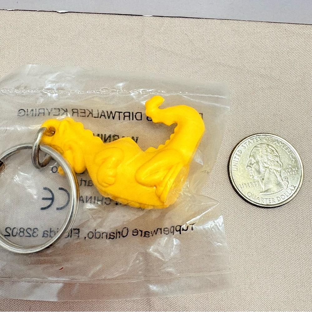 Tupperware Douglas, dirt walker Yellow Keyring keychain